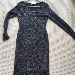 Curve hugging black and silver dress